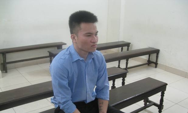 Vẻ mặt bất cần đời của Dương Văn Chí tại toà.