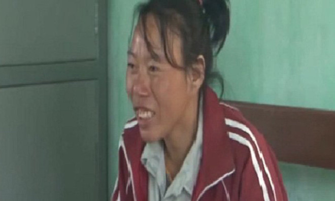 Nguyễn Thị Thực tại cơ quan công an.