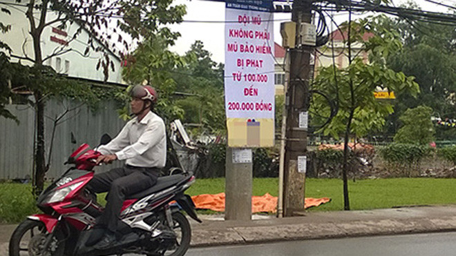 Từ ngày 1/7, người tham gia giao thông bằng xe gắn máy đội mũ bảo hiểm không đúng quy cách, không phải mũ bảo hiểm sẽ bị xử phạt từ 100.000 - 200.000 đồng
