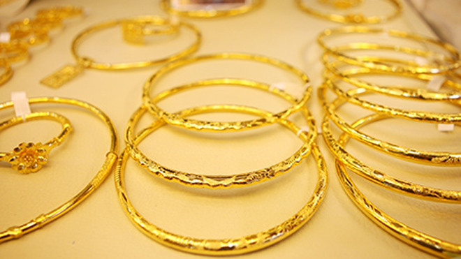 Ngày hiếm hoi giá vàng, USD cùng đi ngang