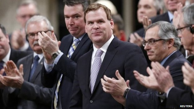 Ngoại trưởng Canada John Baird.