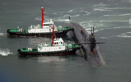 Tàu ngầm hạt nhân USS Michigan của Mỹ vào cảng Busan của Hàn Quốc hôm 25/4. Triều Tiên ngày 25/4 tổ chức một cuộc diễn tập pháo binh lớn mừng ngày thành lập quân đội trong khi Hàn Quốc và Mỹ tiến hành tập trận hải quân khiến căng thẳng khu vực tăng cao. 