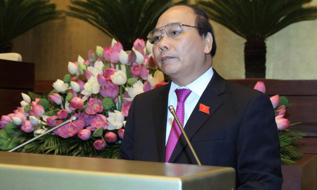 Phó Thủ tướng Nguyễn Xuân Phúc trả lời chất vấn sáng 13/6. Ảnh Như Ý