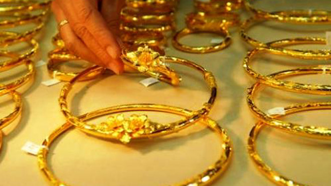 Vừa tăng vàng và USD đã vội giảm