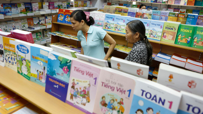 Theo Bộ GD&ĐT, trong tổng số 34.275 tỷ đồng kinh phí dự kiến cho đề án đổi mới chương trình - SGK, chi phí cho công tác biên soạn là 105 tỷ đồng. Ảnh: hồng vĩnh