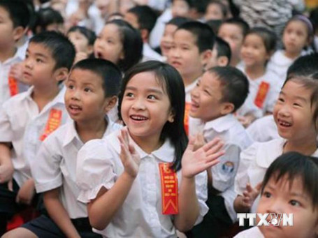 Niềm vui của học sinh trong ngày khai trường. Ảnh: Quý Trung/TTXVN