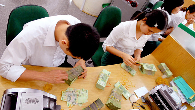 Lãi suất vay cao khiến chi phí doanh nghiệp bị đội lên nhiều. Ảnh: Ngọc Châu