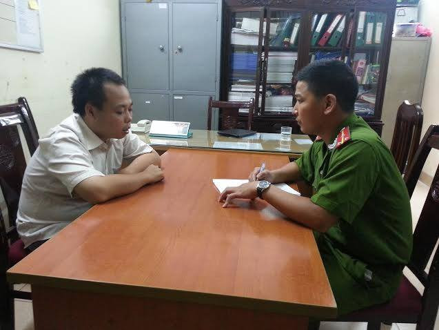 Đối tượng Phan Thanh Bình tại cơ quan công an.