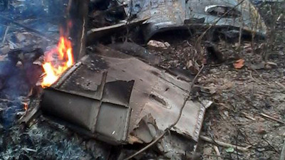 Mảnh vỡ chiếc trực thăng gặp nạn tại hiện trường. 17 chiến sĩ đã hi sinh trong tai nạn thương tâm này