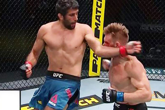 Beneil Dariush ra đòn hạ knock-out đối thủ.