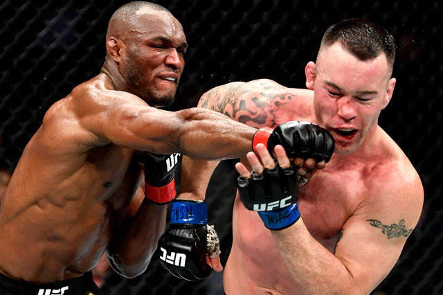Kamaru Usman ra đòn trúng mặt Colby Covington.