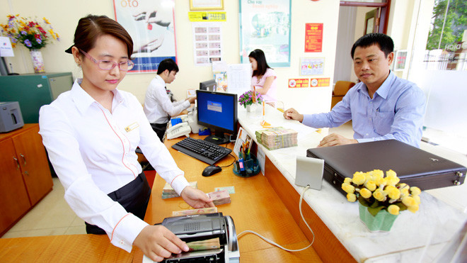 Xử lý, bán lại các khoản nợ xấu đã mua sẽ là áp lực lớn đối với VAMC trong năm 2014. Ảnh: Như Ý