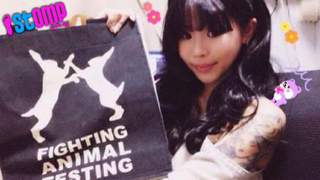 Hình ảnh cô gái xăm hình động vật khắp người.