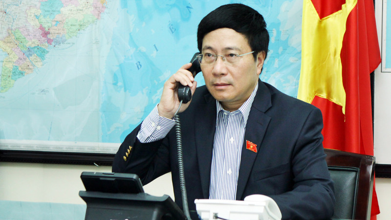 Phó Thủ tướng, Bộ trưởng Bộ Ngoại giao Phạm Bình Minh điện đàm với Ngoại trưởng Mỹ John Kerry. Ảnh: Vụ Thông tin báo chí