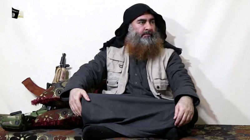 Người đàn ông râu rậm xuất hiện cùng thủ lĩnh IS Abu Bakr al-Baghdadi trong đoạn video được IS công bố vào ngày 29/4 mới đây