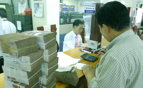 Gửi tiền, không có chuyện Ngân hàng chối bỏ trách nhiệm. Ảnh: Như Ý