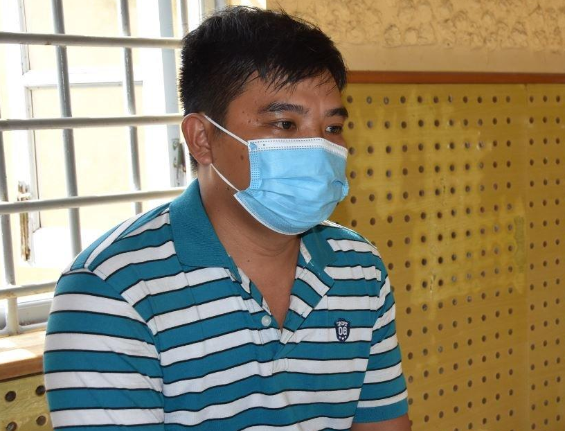 Lê Văn Tiểu tại cơ quan công an.