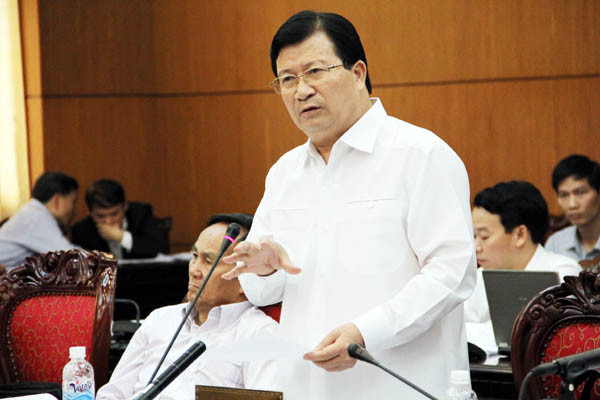 Bộ trưởng Bộ Xây dựng Trịnh Đình Dũng nhận trách nhiệm về quy hoạch treo. Ảnh: C.K