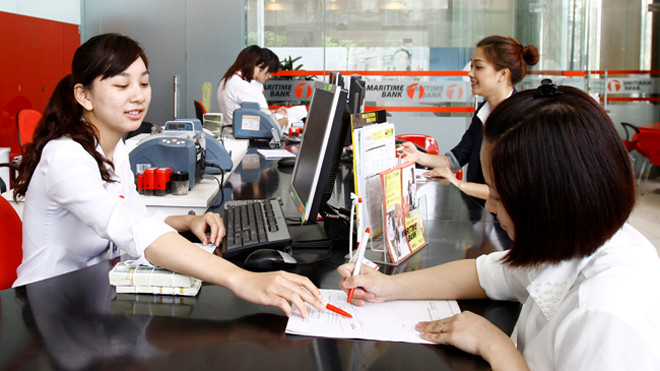 Sáp nhập ngân hàng phải vì lợi ích toàn hệ thống chứ không của riêng ai. Ảnh: Như Ý