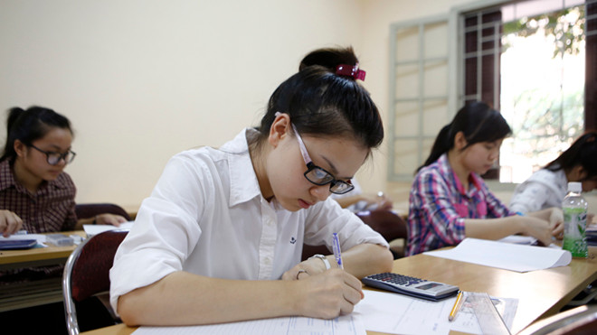 Thí sinh làm bài thi đại học 2014. Ảnh: Hồng Vĩnh