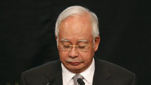 Thủ tướng Malaysia Najib Razak đau buồn thông báo chuyến bay MH370 đã đâm xuống Nam Ấn Độ Dương. Ảnh: Reuters