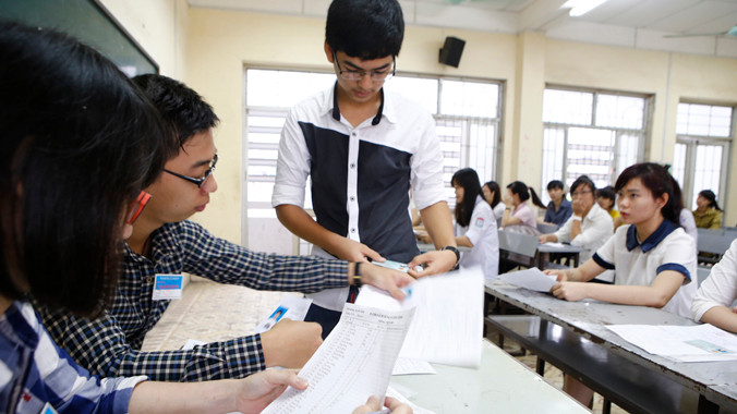 Thí sinh làm thủ tục nhận phòng thi trường Đại học Văn hóa Hà Nội ngày 8/7. Ảnh: Như Ý