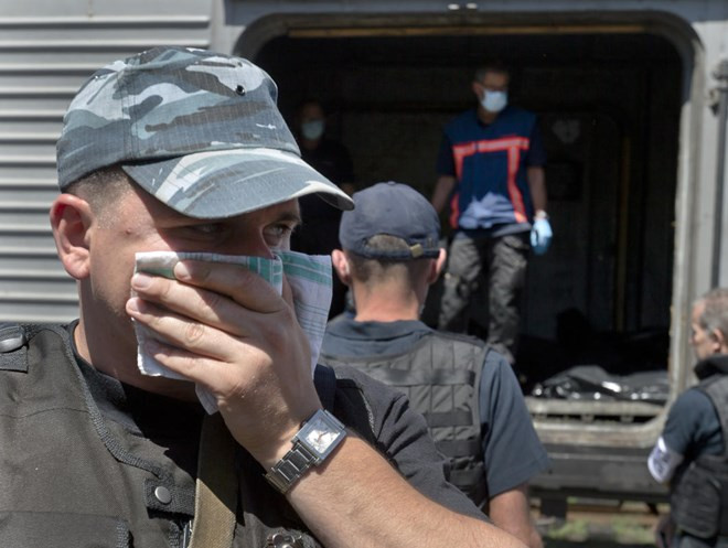 Nhiều thi thể của vụ rơi máy bay MH17 đã bốc mùi (Nguồn: AP) 