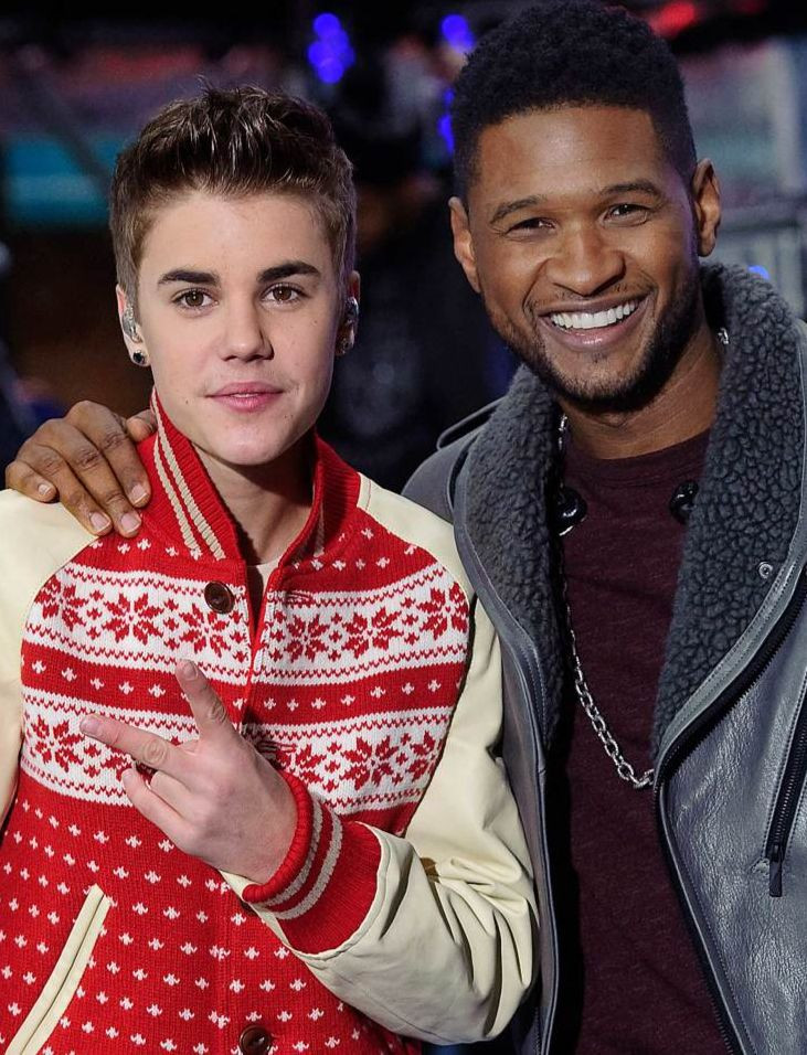 Justin Bieber cùng Usher (trái) và Diddy. Justin Bieber cùng Usher (trái) và Diddy.