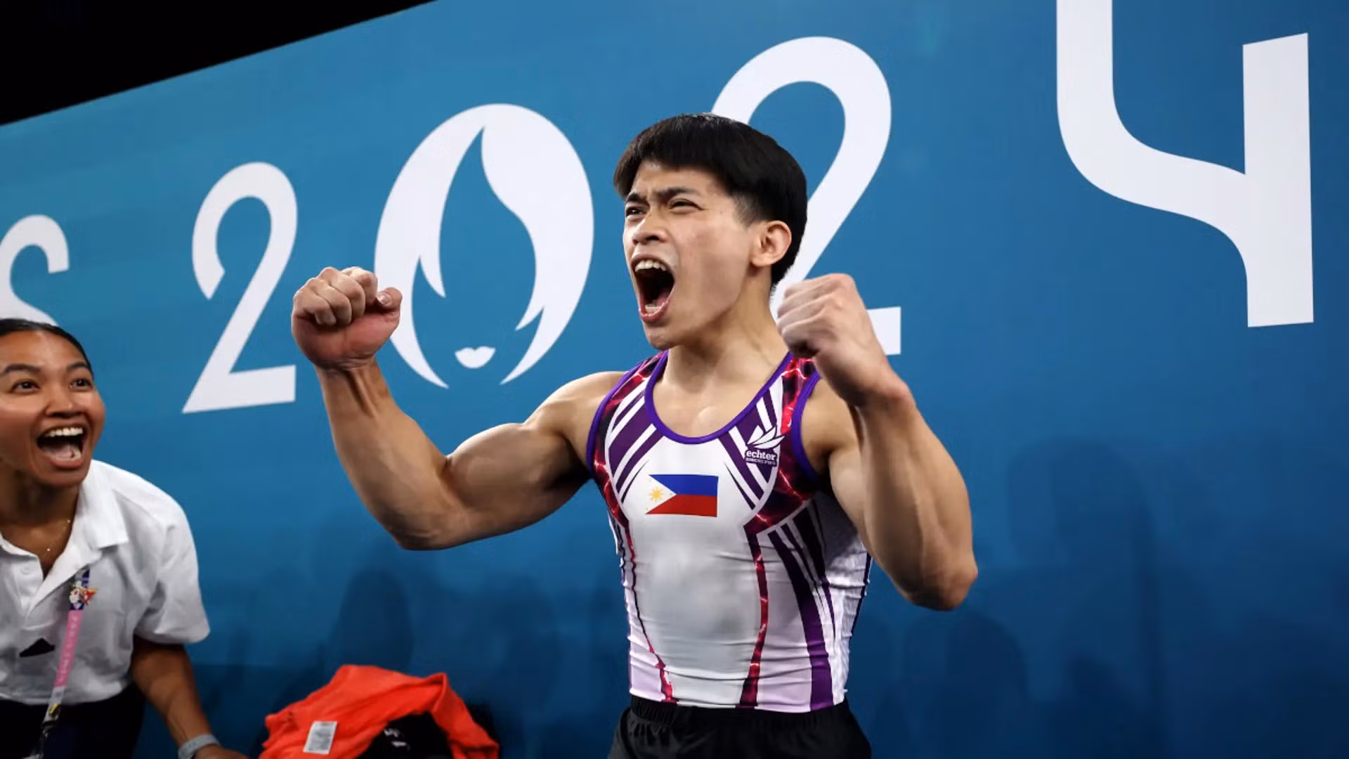 Carlos Yulo và khoảnh khắc chiến thắng ở Olympic Paris 2024.