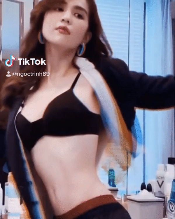 Ngọc Trinh giật tung áo lộ nội y, khoe vòng eo 54 cm hút mắt ảnh 1