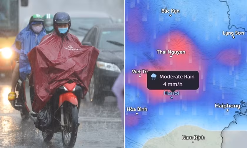 Người dân Hà Nội di chuyển trong mưa khi không khí lạnh tràn về