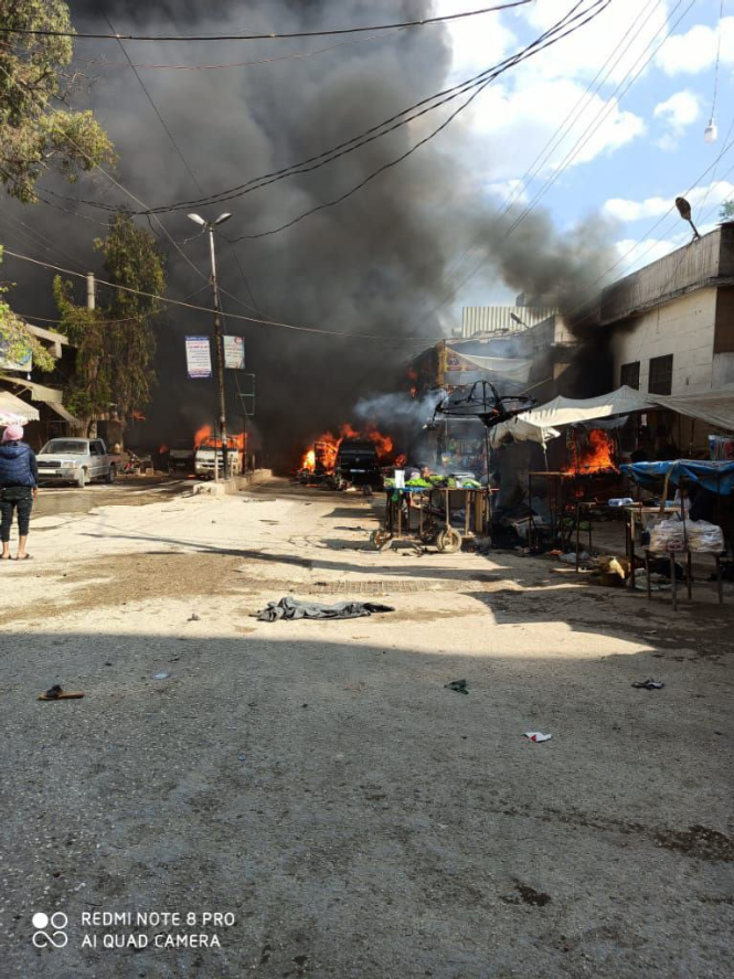 Hiện trường vụ nổ bom xe ở Syria khiến gần 100 nguời thương vong ảnh 2