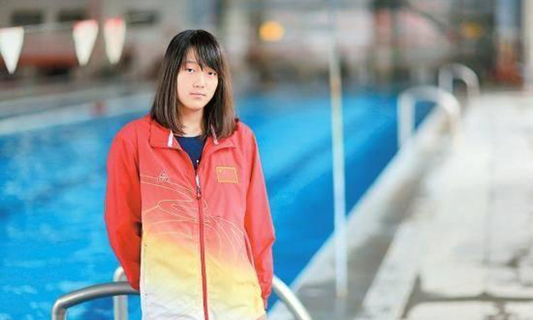 Cô bé cụt nửa người thành tay bơi cự phách ảnh 3