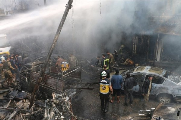 Hiện trường vụ nổ bom xe ở Syria khiến gần 100 nguời thương vong ảnh 3