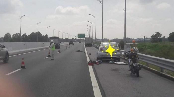 Bị xe tải tông chết khi đang thay lốp trên cao tốc ảnh 1