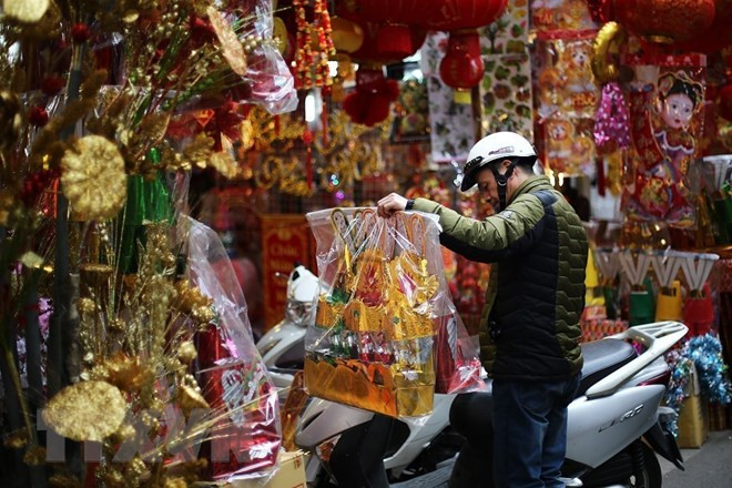 Phong tục của người Việt trong lễ cúng ông Công ông Táo ảnh 2