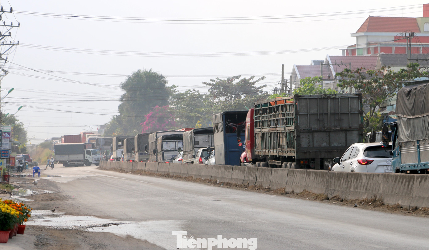 Người dân ùn ùn về quê ăn Tết, quốc lộ miền Tây ùn tắc từ trưa tới tối ảnh 13