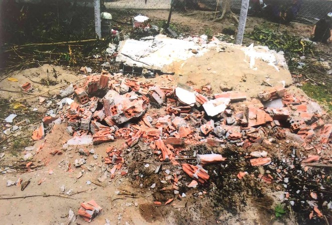 Bắt nghi phạm đào mộ đốt hài cốt mẹ vợ của con nợ ảnh 1