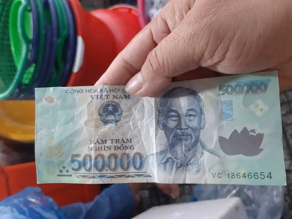 Kiên Giang: Điều tra đối tượng dùng tiền giả đi chợ mua hàng ảnh 2