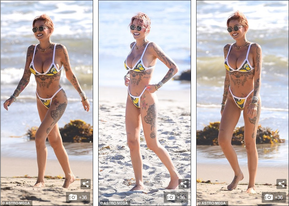 Mỹ nhân Tina Louise hôn đắm đuối ‘trùm’ hip-hop trên bãi biển ảnh 7