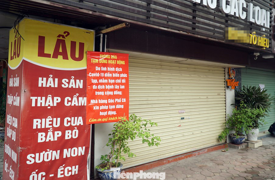 Hàng loạt cửa hàng, quán ăn ở Cầu Giấy đóng cửa phòng Covid-19 ảnh 4