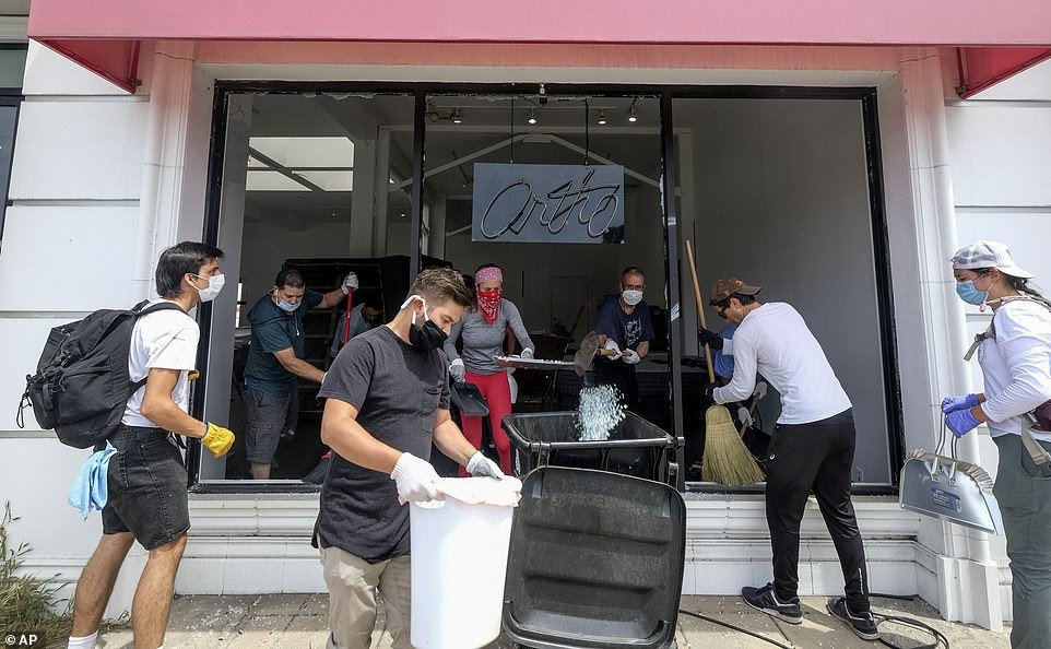 Nước Mỹ tan hoang sau một tuần 'không ngủ' vì bạo loạn ảnh 10