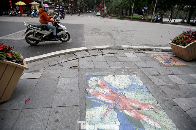 Bức tranh nghệ thuật trên nắp cống, hố ga ở Hà Nội ảnh 10