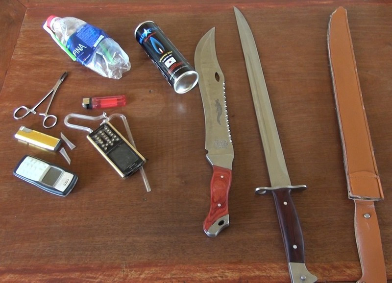 Giằng mã tấu không được liền lấy đao chém cán bộ công an ảnh 2