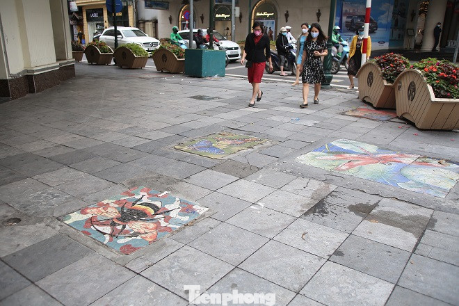 Bức tranh nghệ thuật trên nắp cống, hố ga ở Hà Nội ảnh 8