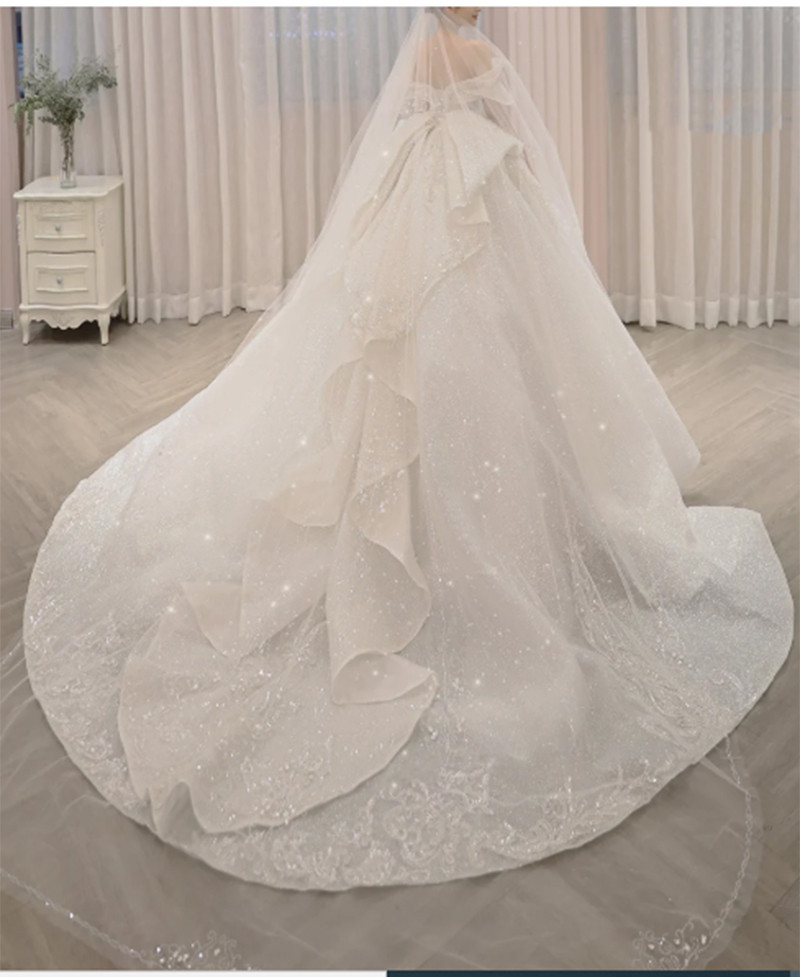 Cận cảnh váy cưới 28 tỉ đồng của Xoài Non - vợ Xemesis, streamer giàu nhất Việt Nam ảnh 5