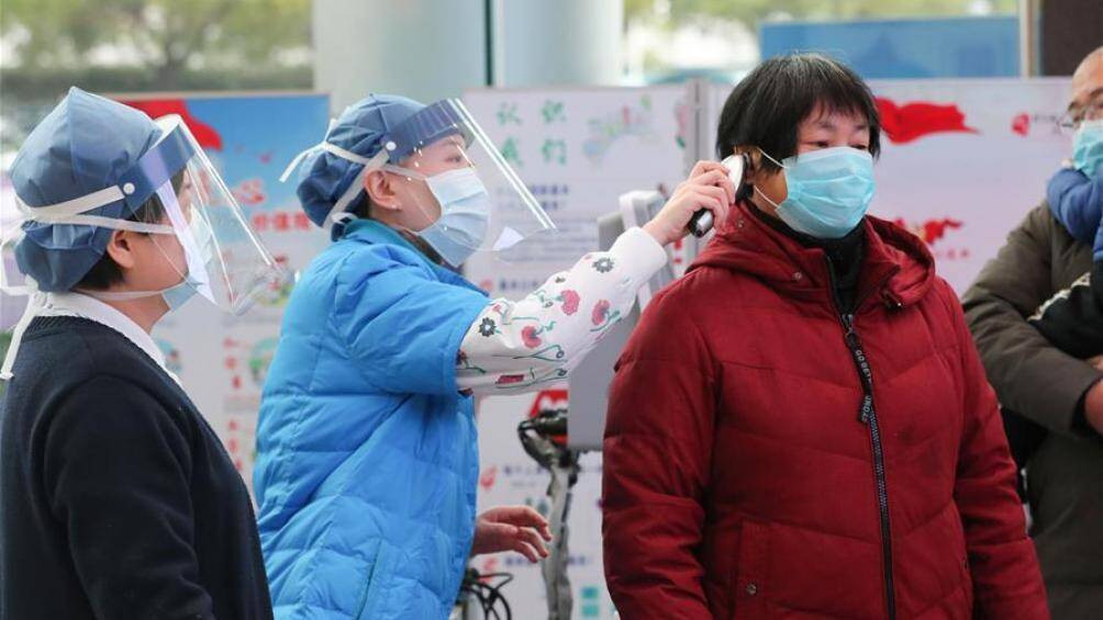 Những người hy sinh thầm lặng giữa dịch bệnh ở Vũ Hán ảnh 1