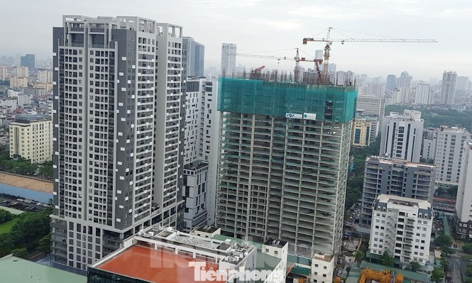Yêu cầu Bộ Xây dựng làm rõ việc xây tầng lánh nạn đẩy giá căn hộ ảnh 1
