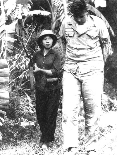 O du kích nhỏ Ảnh:Phan Thoan: Nguồn: Wikipedia tiếng Việt Chuyện từ bức ảnh 'o du kích nhỏ' ảnh 2