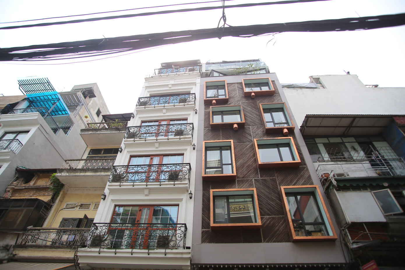  Cắt ngọn hàng loạt công trình sai phép tồn đọng ở quận 'lõi' Hà Nội ảnh 2